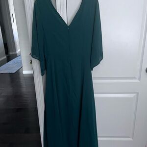 Size Large (10/12) in a forest green dress.  Never been worn.  $50